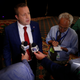 Republican Corey Stewart, left, talks to reporters after the Virginia Bar Association debate with US Sen. Tim Kaine at the Homestead in Hot Springs, Va., Saturday, July 21, 2018.
